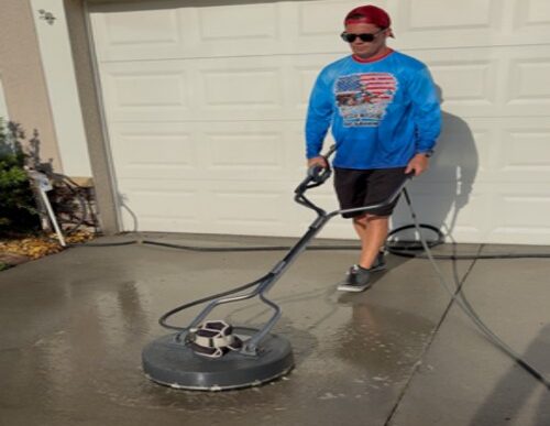 Before and after image of professional driveway and sidewalk cleaning in Hillsborough County